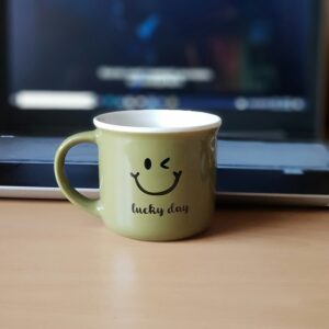 White and black ceramic mug